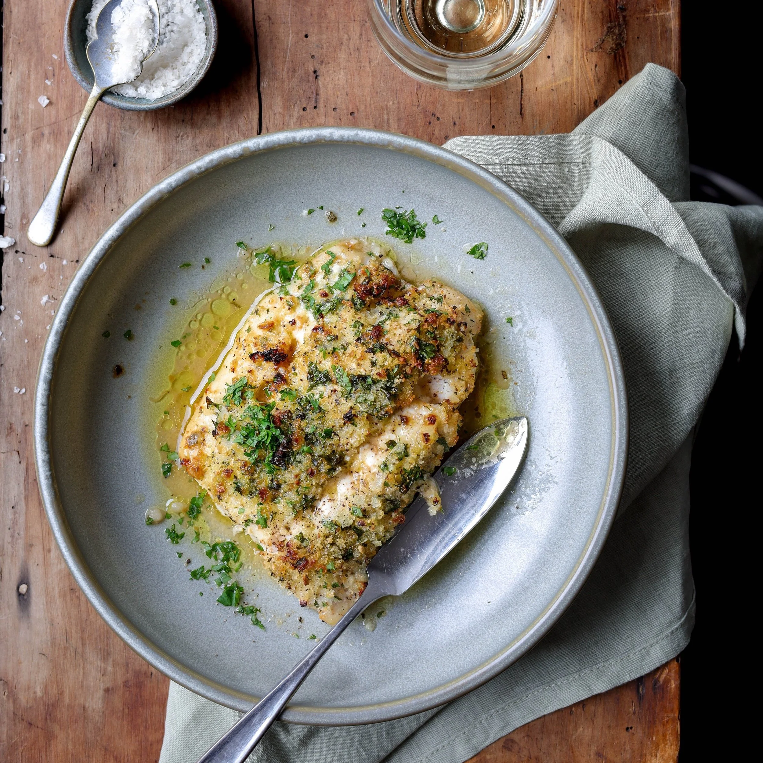 Baked fish with wine and butter sauce
